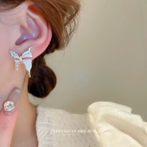 Zomer nieuwe hete luxe vloeibare vlinderoorbellen, niche high-end elegante retro-stijl damesmode oorsieraden